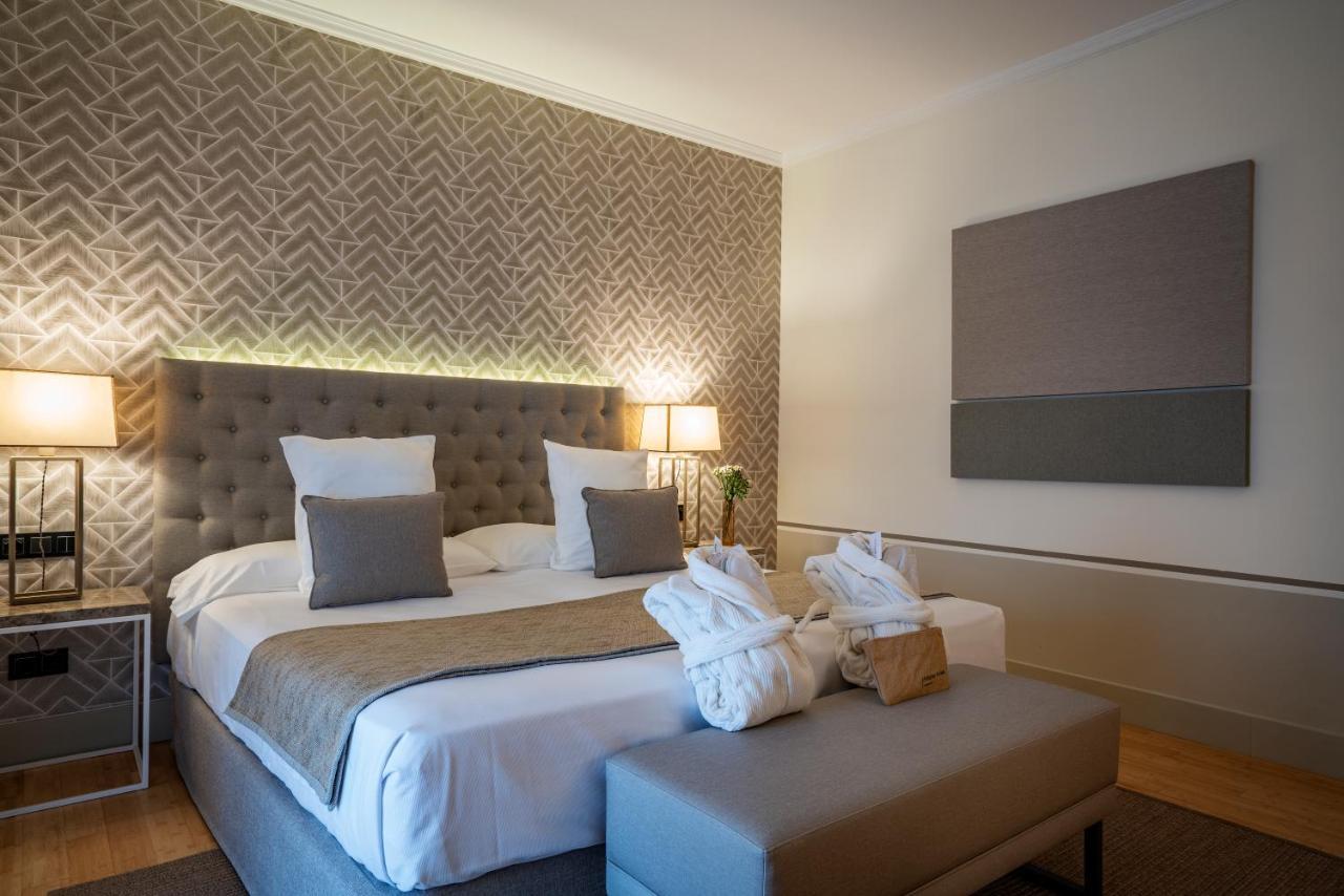 فندق هوسبيس بالاسيو دي أريناليس آند سبا Caces المظهر الخارجي الصورة A room at the hotel